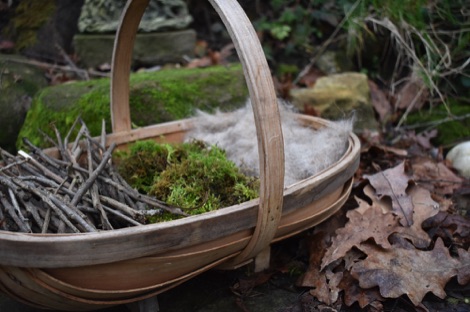 Nesting materials in a basket